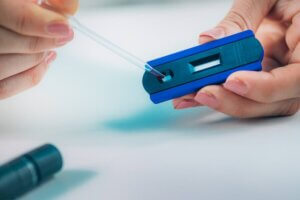 A doctor testing a sample for Covid-19